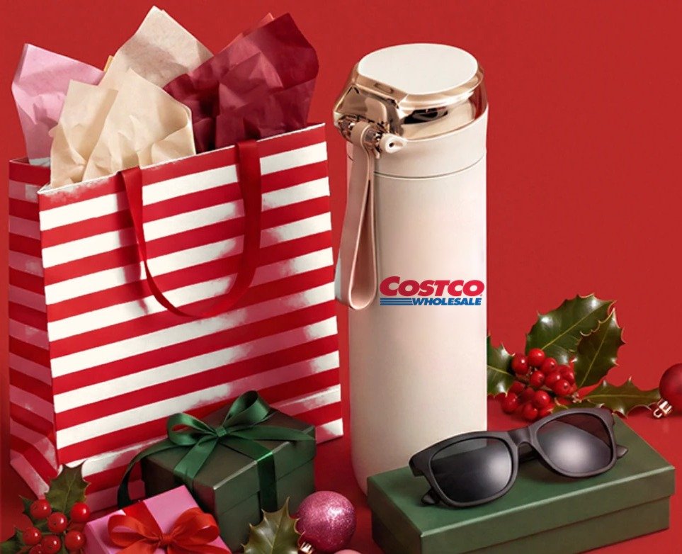 Costco gift kit with a branded bottle, striped bag, sunglasses, and wrapped presents